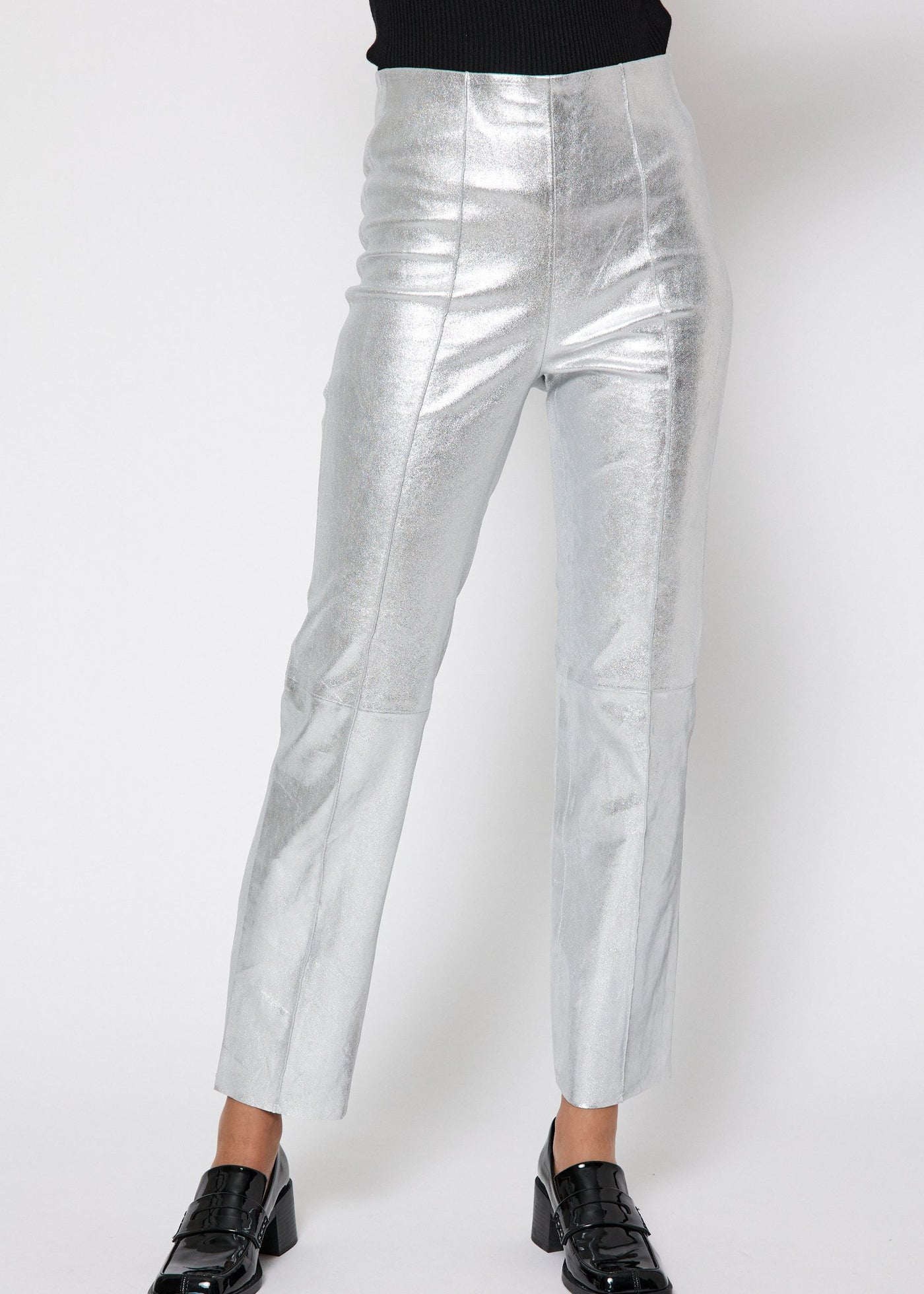 These leggings are made of soft, stretchy silver lamb leather from the Danish  brand NORR