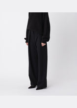 Load image into Gallery viewer, Won Hundred Lulu Trousers In Black — worn view, face cropped