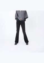 Load image into Gallery viewer, Won Hundred Salima Denim Pants In Black — worn view, face cropped
