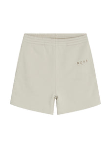 NORR Daisy sweat shorts with a relaxed fit, featuring a hidden tie string in waist and a small logo print on the front leg. Organic cotton