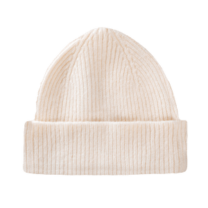 le bonnet en laine blanc