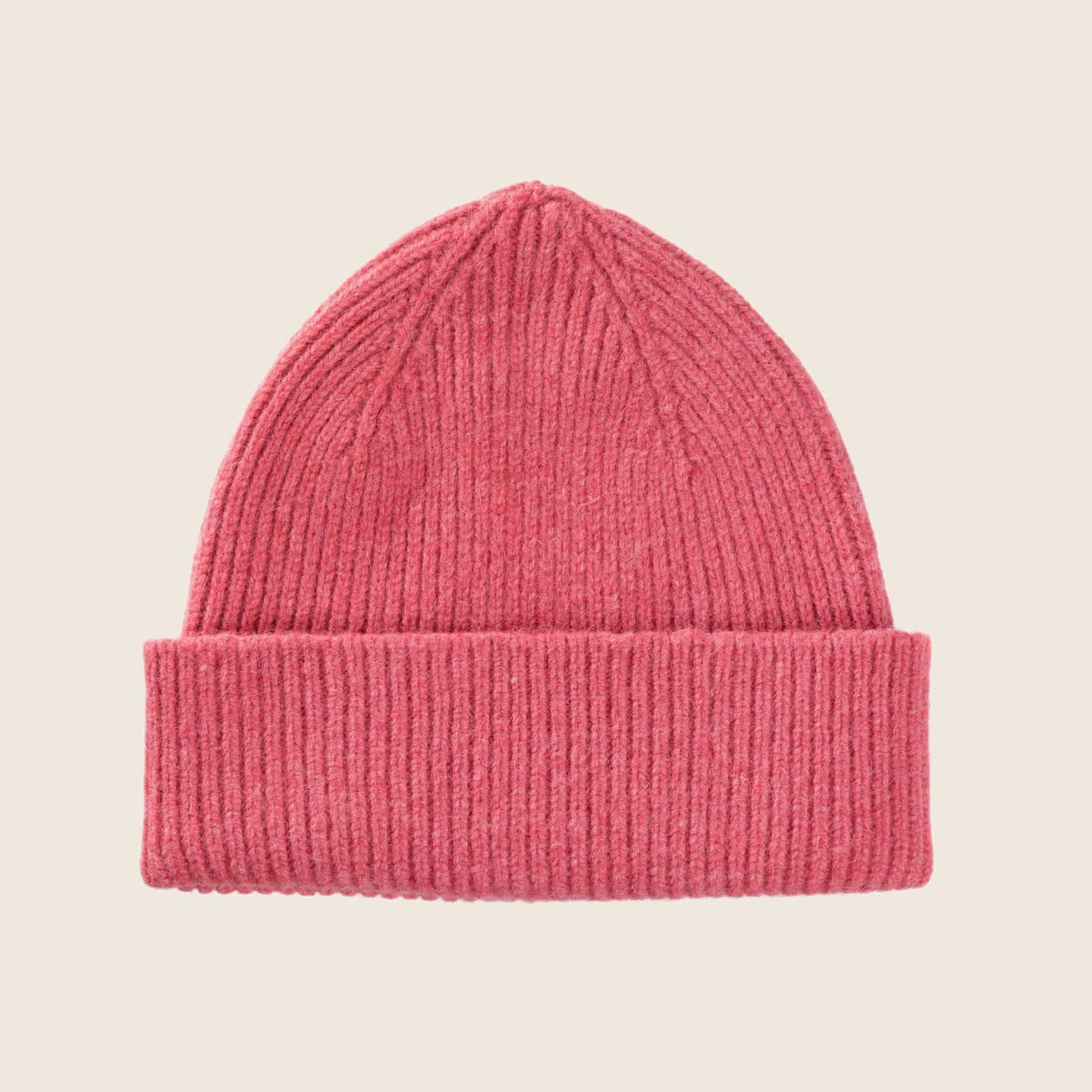 le bonnet en laine rose